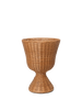 Wicker plant stand on a white background