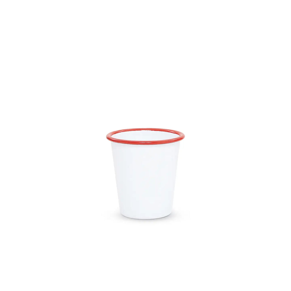 White cup with red rim on a white background