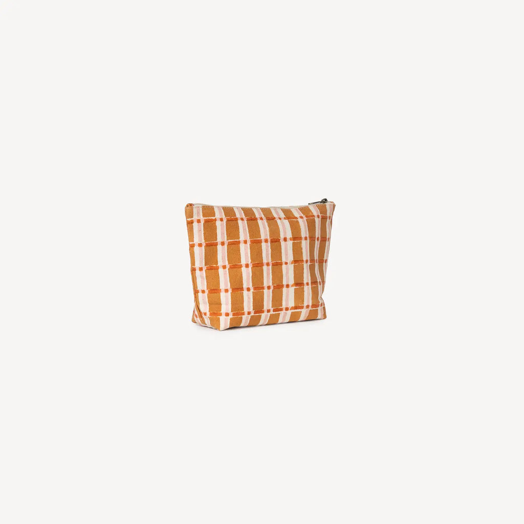 Plaid patterned pouch on a white background