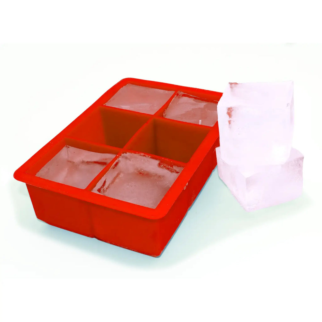Red silicone ice cube tray with partially filled ice cubes on a white background