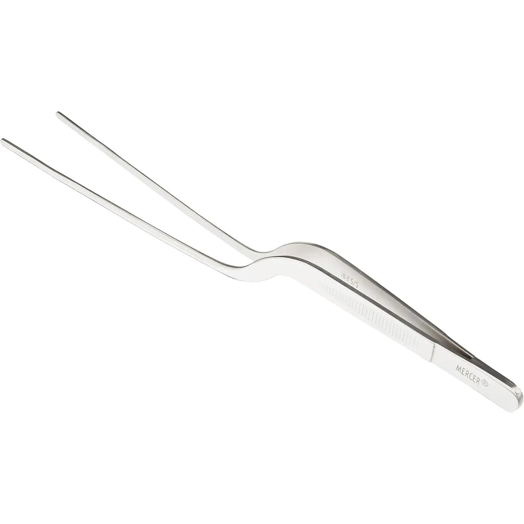 Metallic kitchen tool on a white background