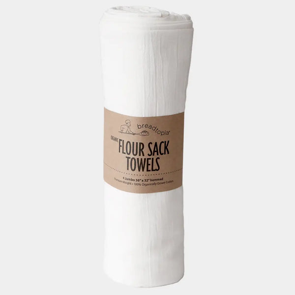 Roll of flour sack towels with a label on a white background
