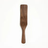 Wooden spatula on a white background
