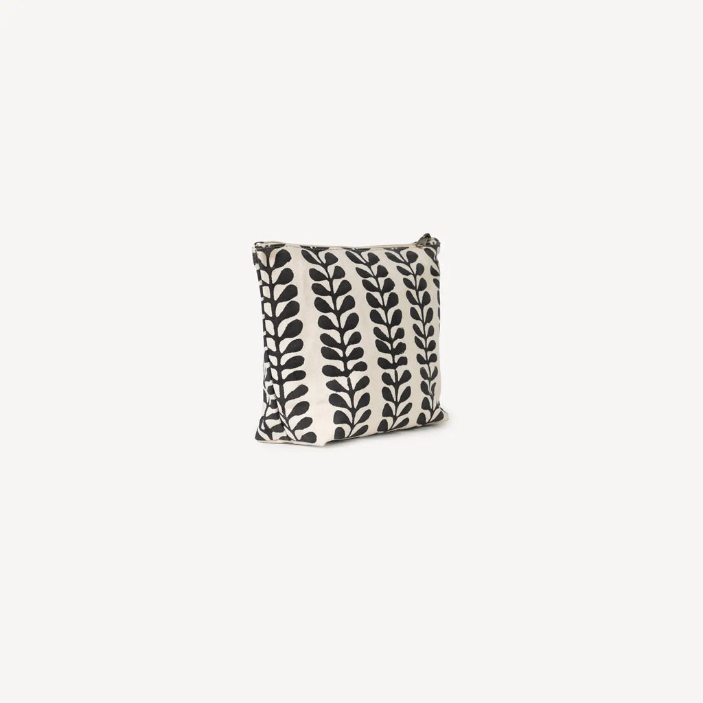 Pouch with black leaf pattern on a white background