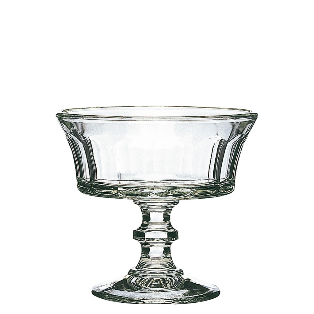 Clear glass footed bowl on a white background
