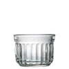 Clear glass tumbler with textured design on a white background