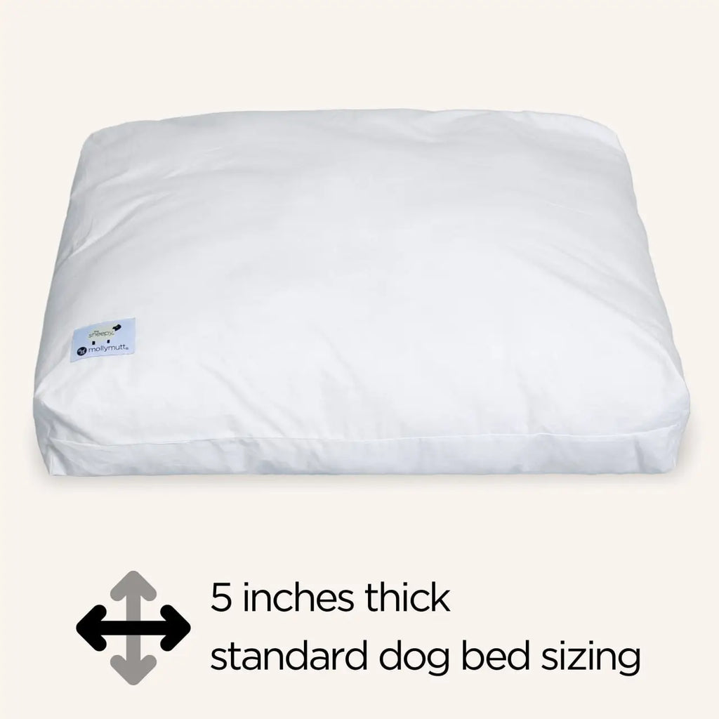 White dog bed with text indicating thickness and standard size on a white background