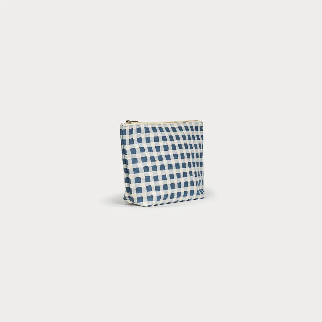 Small pouch with blue and white checkered pattern on a light gray background