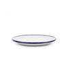 White plate with a blue rim on a white background