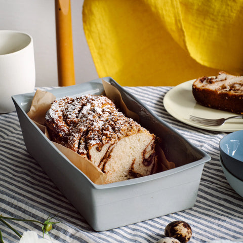 small porcelain baking dish with bread in it