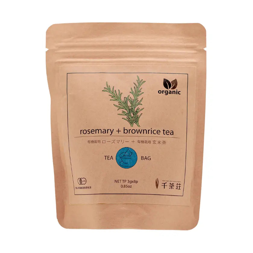 Tea bag packaging with rosemary and brown rice label on a white background