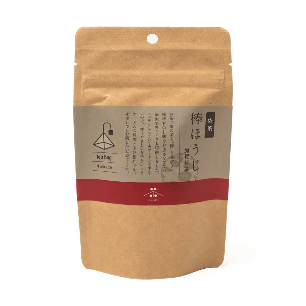 Kraft paper tea bag packaging with a red label on a white background