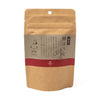 Kraft paper tea bag packaging with a red label on a white background