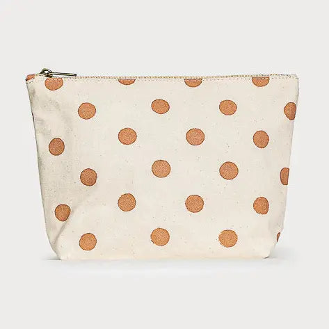 Beige pouch with brown polka dots on a white background