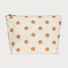 Beige pouch with brown polka dots on a white background