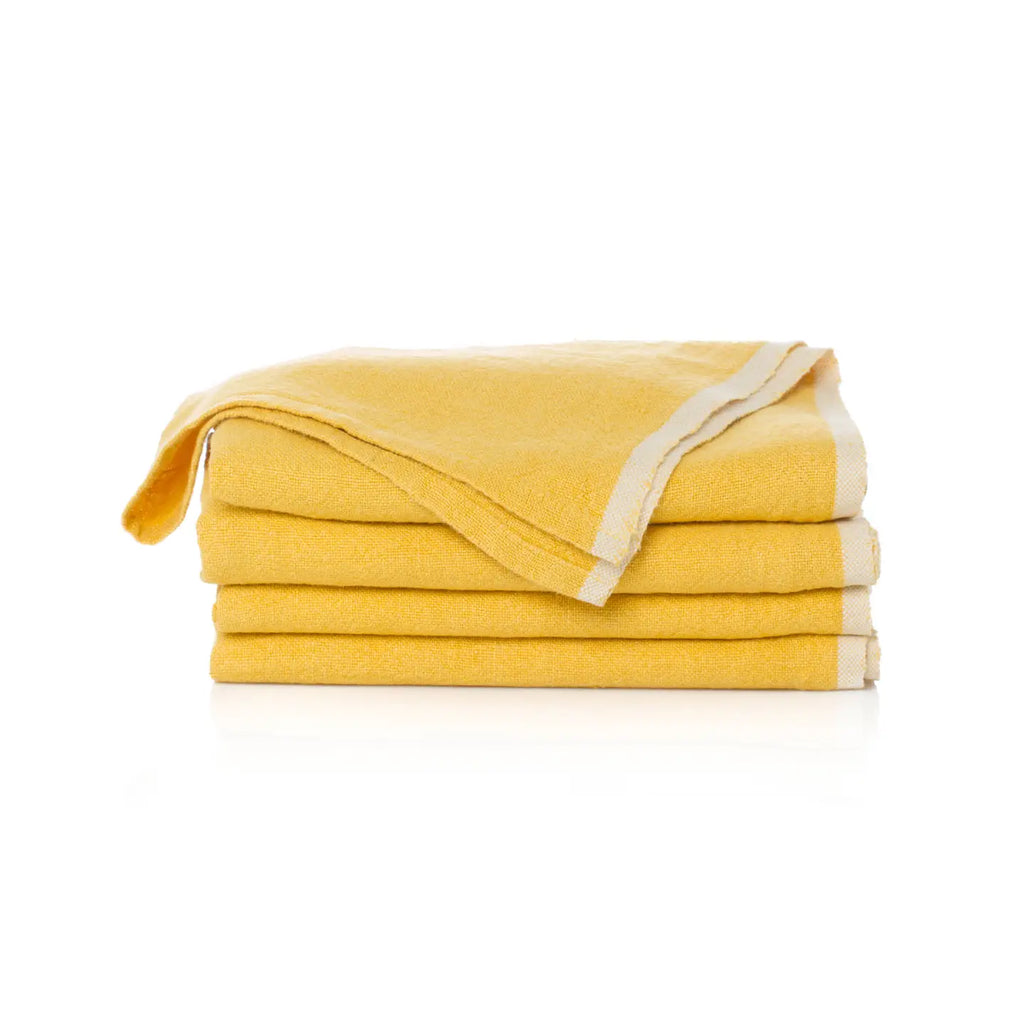 Stack of yellow towels on a white background