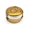 Gold and silver two-tiered container on a white background