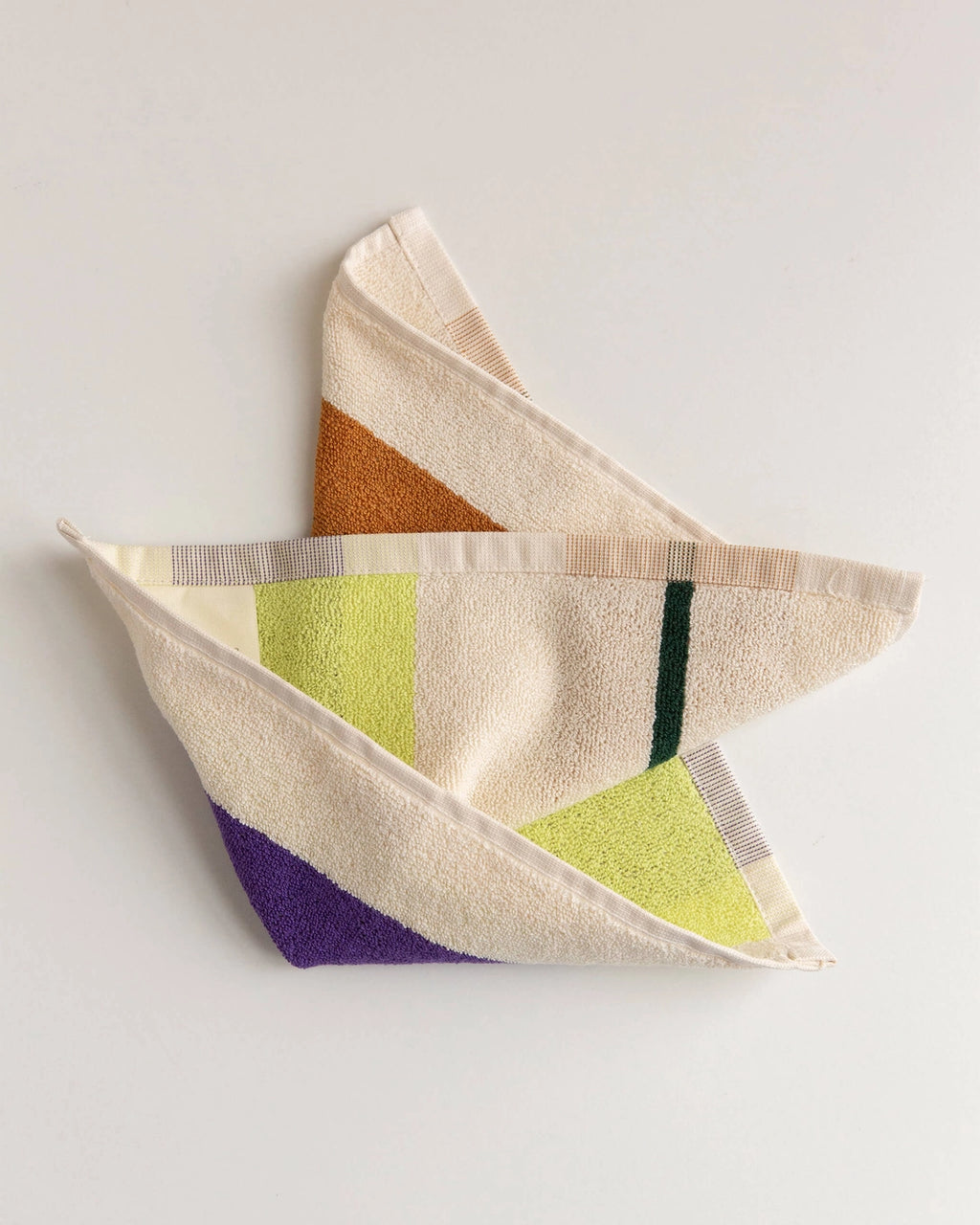 Colorful fabric towel on a white background