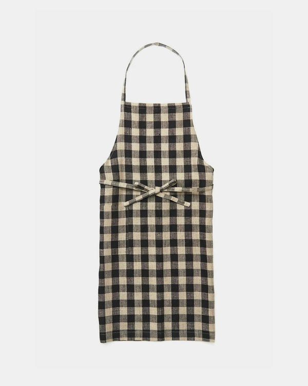 Black and beige checkered apron on a white background