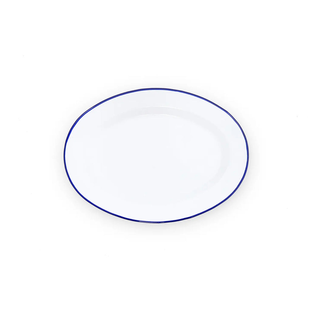 White plate with a blue rim on a white background
