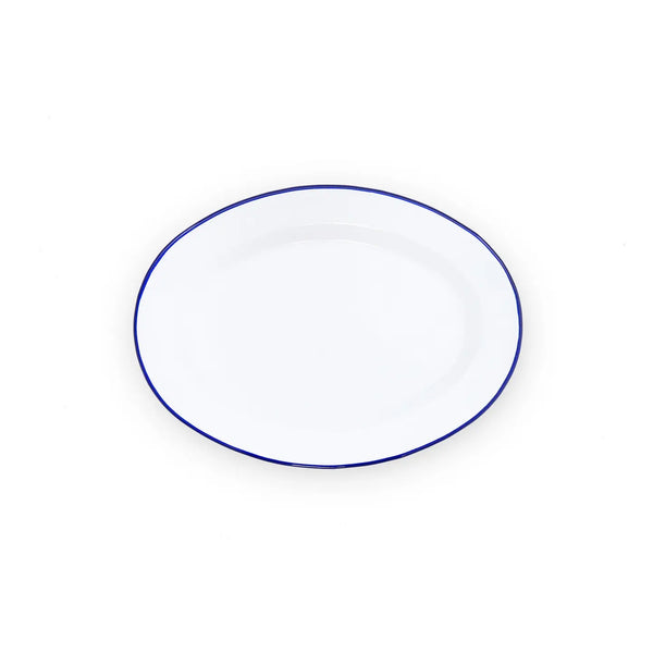 White plate with a blue rim on a white background