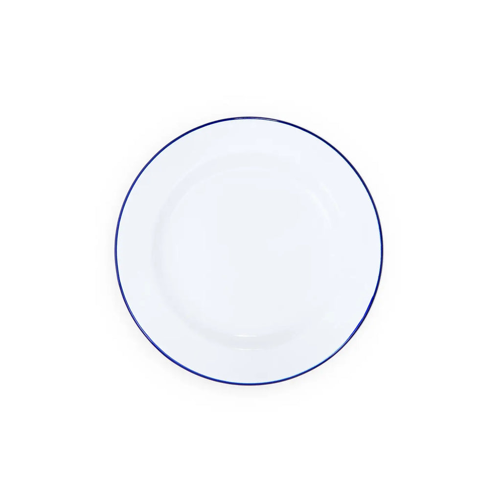 White plate with a blue rim on a white background
