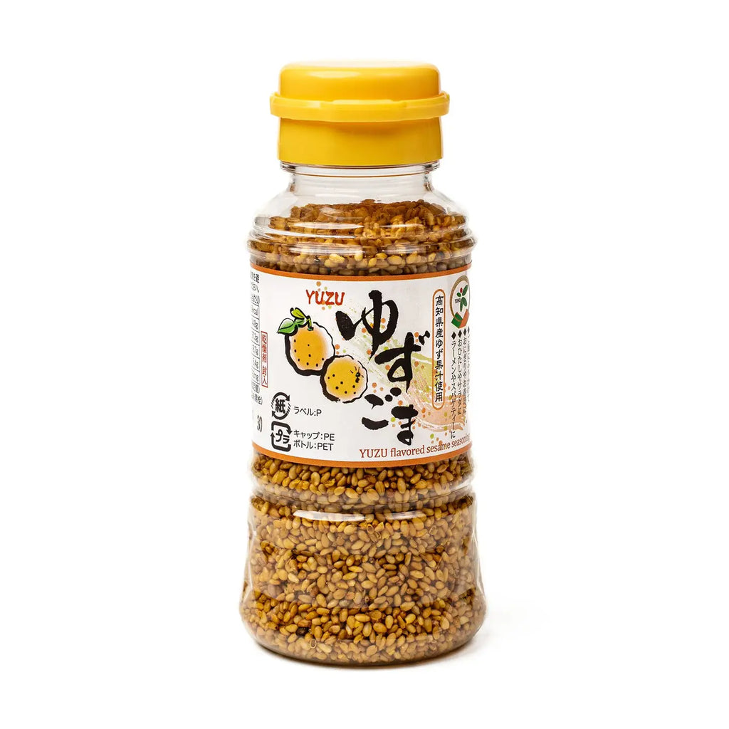 Bottle of Yuzu seasoning with a yellow cap on a white background