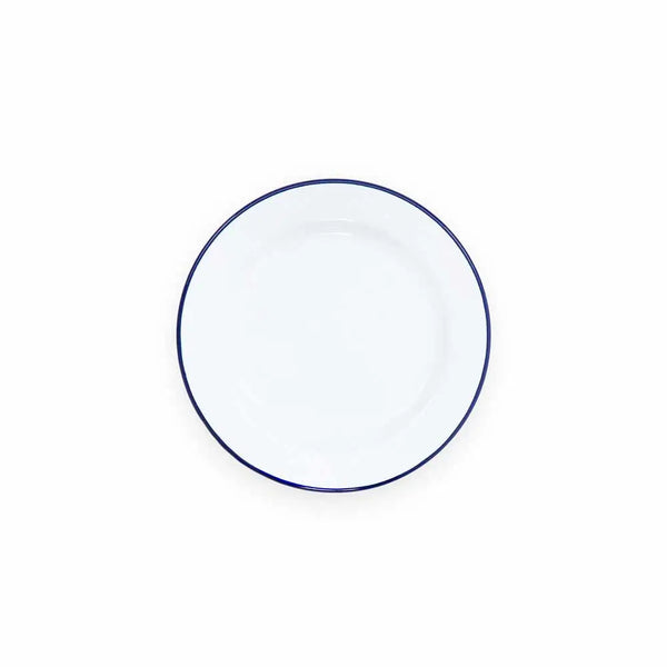 Round white plate with a blue rim on a white background
