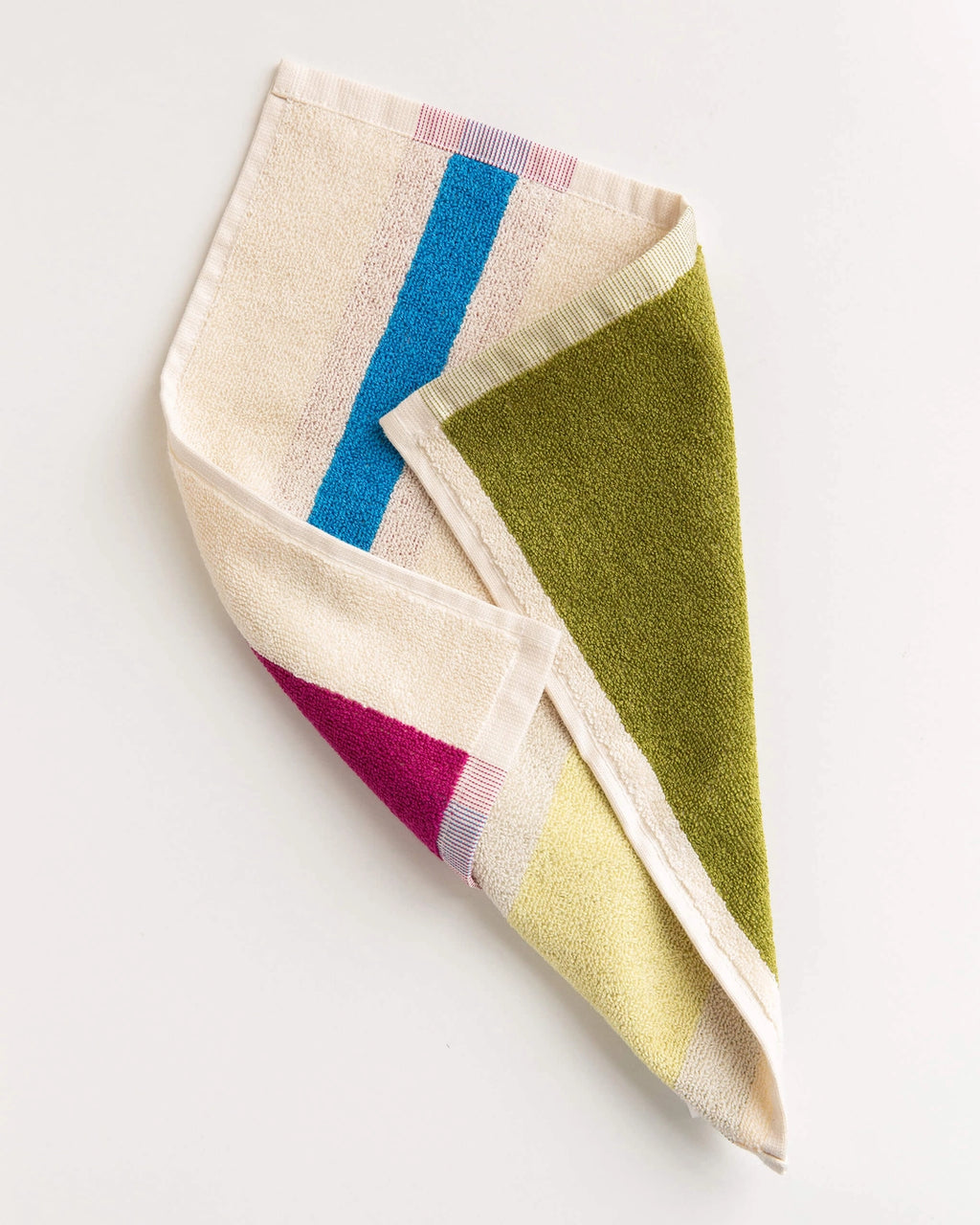 Colorful towel with geometric pattern on a white background