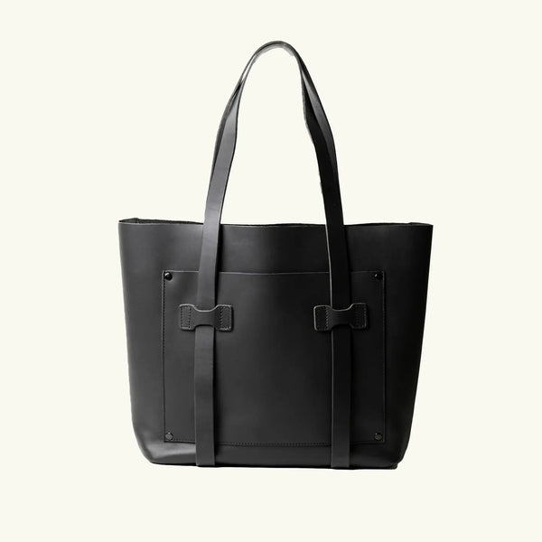 Black tote bag with shoulder straps on a white background