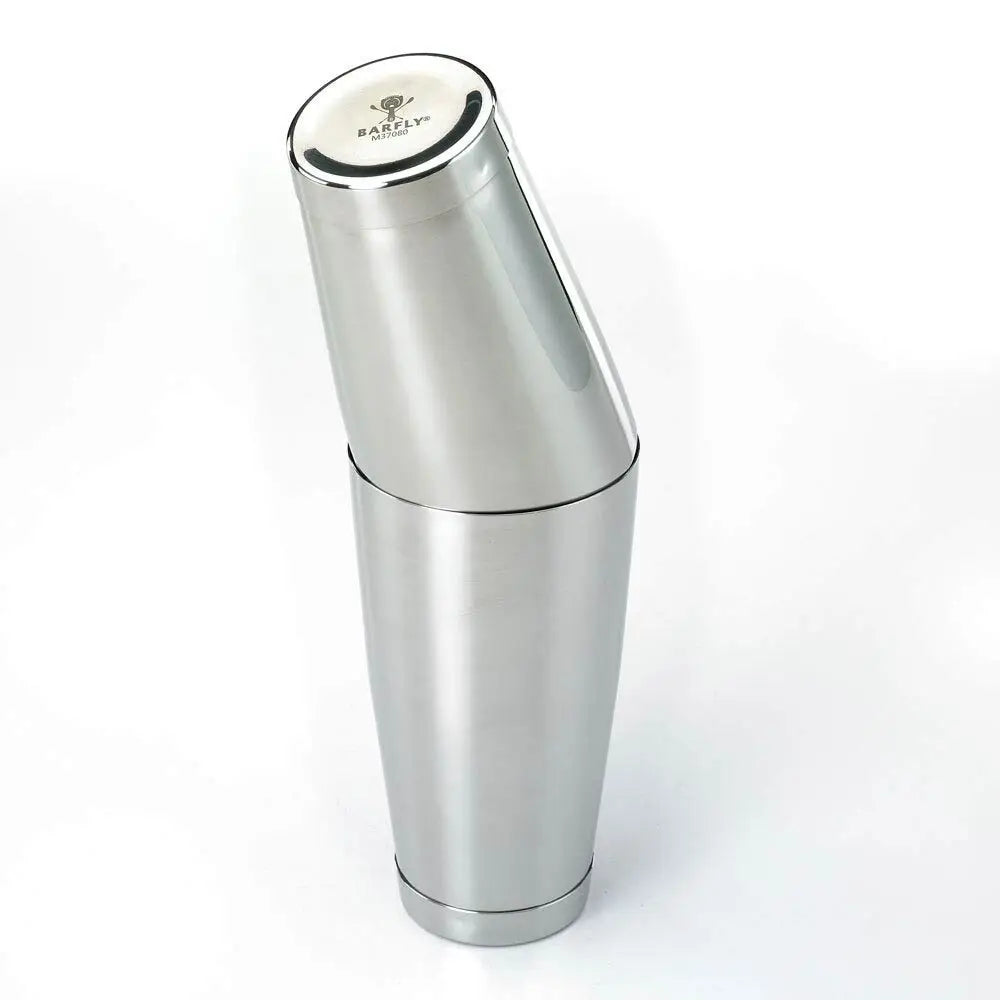 Silver cocktail shaker with a brand logo on a white background