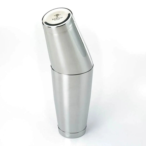 Silver cocktail shaker with a brand logo on a white background