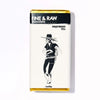 Fine & Raw chocolate bar packaging with an illustration of a person wearing a hat and coat on a white background.