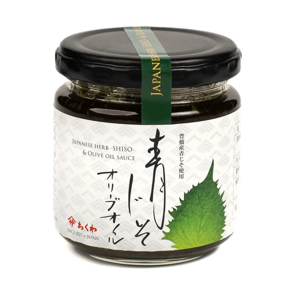 Jar of Japanese herb shiso olive oil sauce with a black lid and green label.