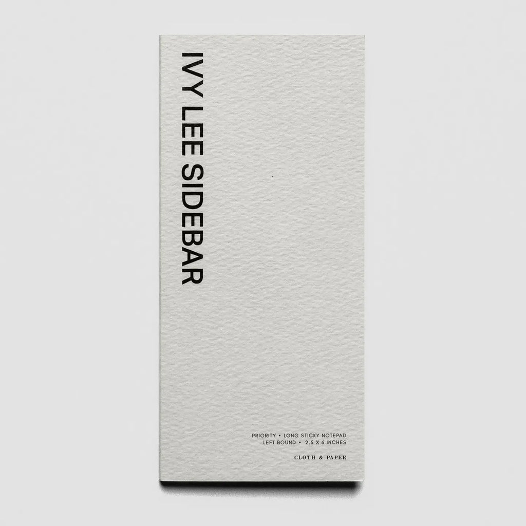 A tall, narrow white textured paper pack or box standing upright on a light gray background. The front has the text 'IVY LEE SIDEBAR' printed vertically in black near the top, with smaller black text near the bottom and a small circular logo.