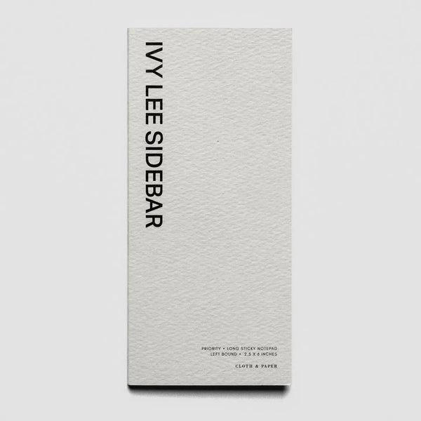 A tall, narrow white textured paper pack or box standing upright on a light gray background. The front has the text 'IVY LEE SIDEBAR' printed vertically in black near the top, with smaller black text near the bottom and a small circular logo.