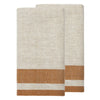 Two folded woven towels with a cream and tan herringbone pattern and a rust-brown striped border near the bottom, shown on a plain white background.