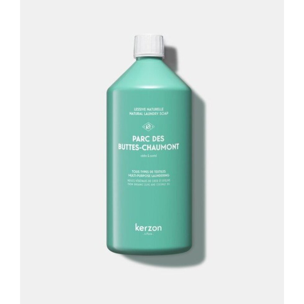 Green bottle of Parc des Buttes-Chaumont laundry soap by Kerzon on a white background